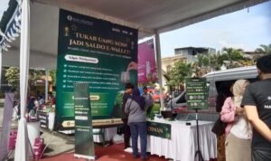 Exchange Coins for E-Wallet Balance and Donate to Dompet Dhuafa at Serambi BI Malang