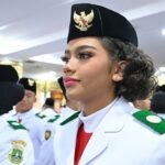 The Profile of Neeltje Deliana, Flag Tray Bearer at the Indonesia Independence Day Ceremony