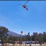 Water-Bombing Helicopter Deployed to Extinguish Forest and Land Fires at Kawah Ijen