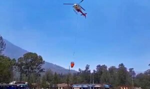 Water-Bombing Helicopter Deployed to Extinguish Forest and Land Fires at Kawah Ijen