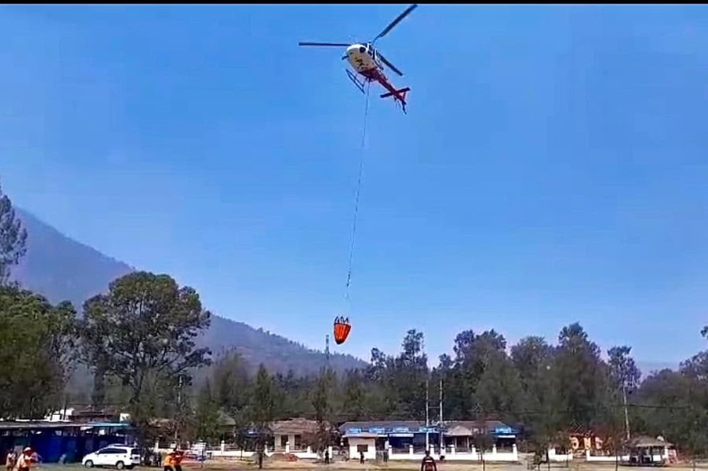 Water-Bombing Helicopter Deployed to Extinguish Forest and Land Fires at Kawah Ijen