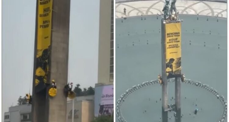 Greenpeace Activists Scale Welcome Monument in Jakarta, Unfurl Banners Demanding Climate Action and Lower Living Costs